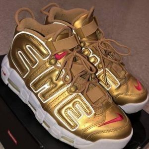 Gold uptempo supreme Nike